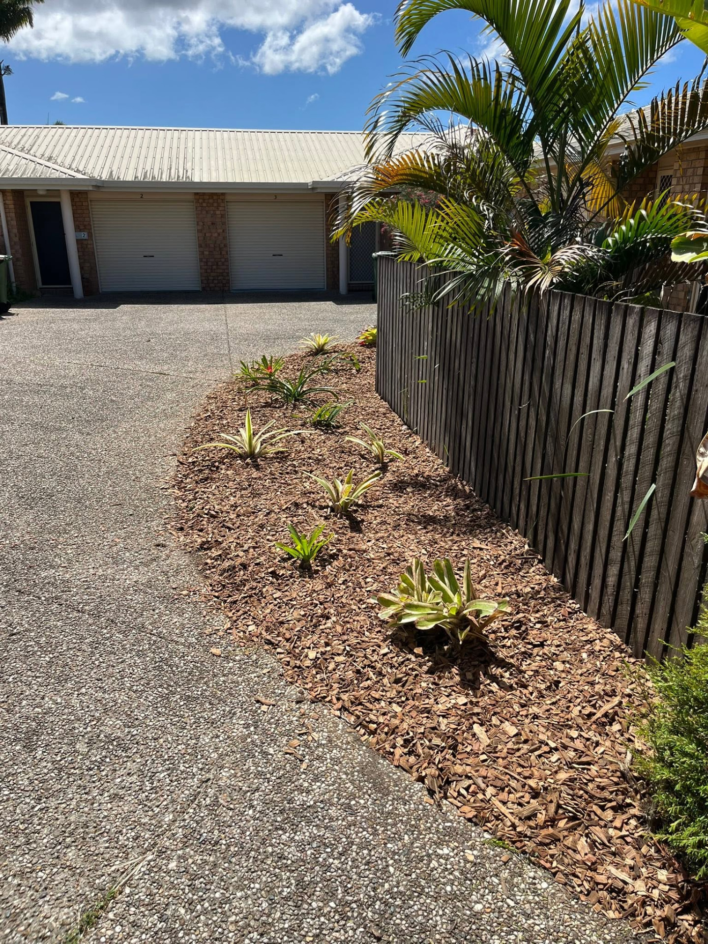 Tidied and mulched garden bed after a property clean up in Mackay
